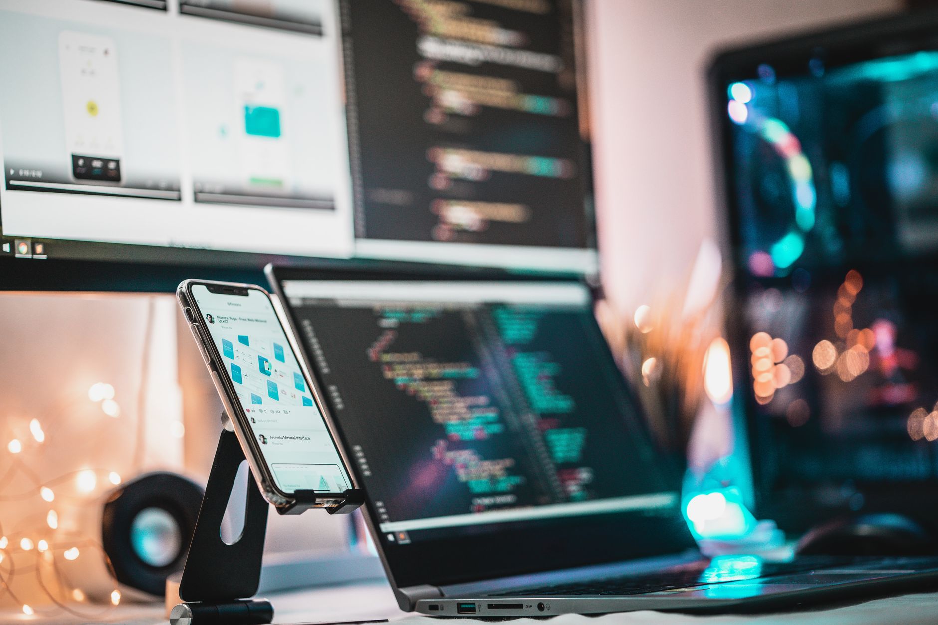 Small business owner managing social media automation tools on a laptop
